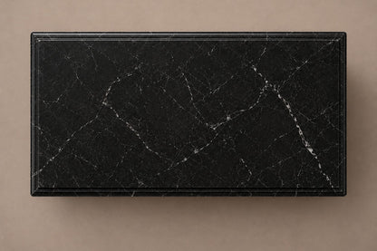 Low wide black Nero Marquina marble base carved with an arcade of pointed Gothic arches on colonnettes.