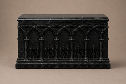 Low wide black Nero Marquina marble base carved with an arcade of pointed Gothic arches on colonnettes.