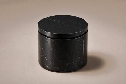 Circular Shadow-Gap Base Tall black marble plinth base by 1-OPH, three-quarter studio view