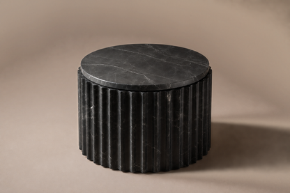 Fluted Drum Base Wide black marble plinth base by 1-OPH, three-quarter studio view