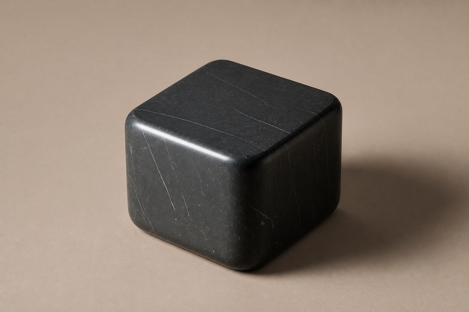 Rounded Cube Base Tall black marble plinth base by 1-OPH, three-quarter studio view