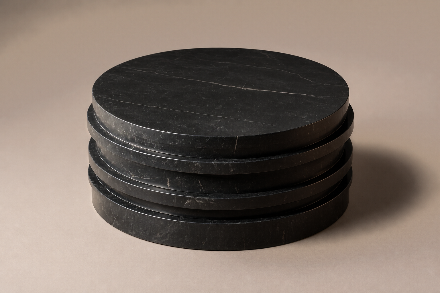 Stacked Disc Base Tall black marble plinth base by 1-OPH, three-quarter studio view