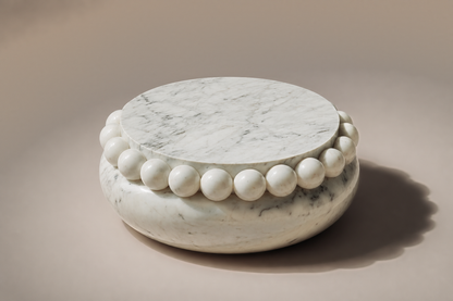 Carrara Beaded Pillow Base black marble plinth base by 1-OPH, three-quarter studio view