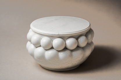 Beaded Pillow Plinth Statuario black marble plinth base by 1-OPH, three-quarter studio view