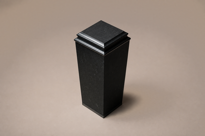 Tapered Pedestal Base Slim black granite plinth base by 1-OPH, three-quarter studio view