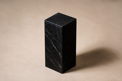 Beveled Monolith Base Block black marble plinth base by 1-OPH, three-quarter studio view