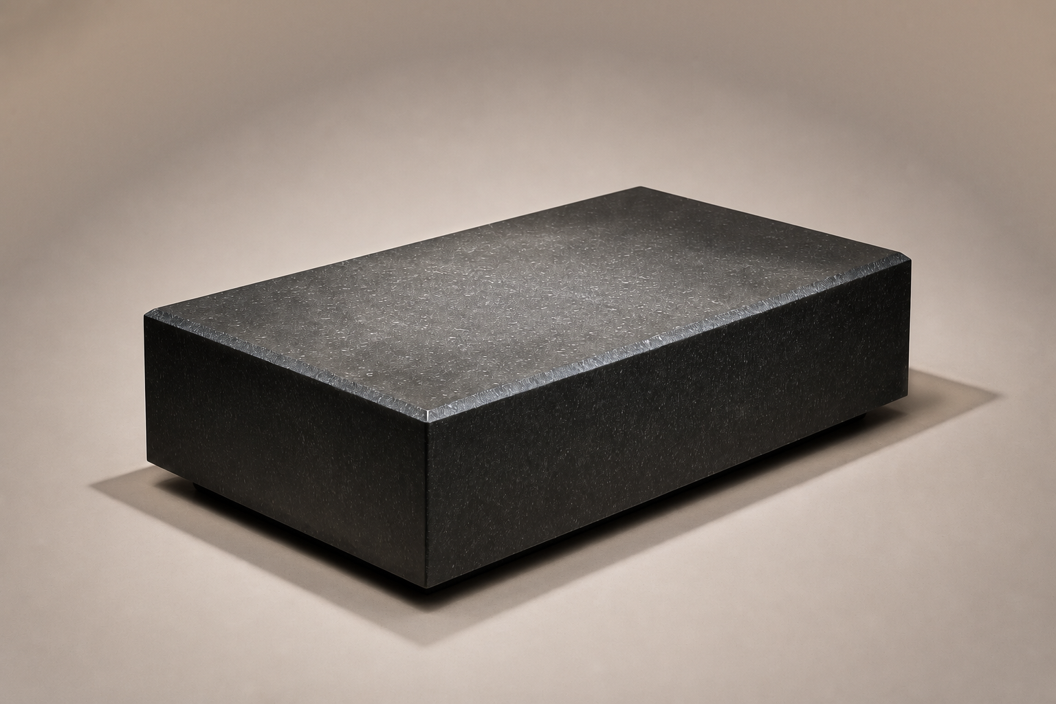 Chamfered Block Base Wide black marble plinth base by 1-OPH, three-quarter studio view