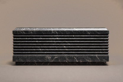 Grigio Ribbed Base Deep grigio carnico marble plinth base by 1-OPH, side elevation