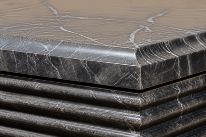 Grigio Ribbed Base Deep grigio carnico marble plinth base by 1-OPH, surface detail