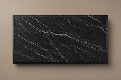 Knife-Edge Base Tapered black marble plinth base by 1-OPH, overhead view