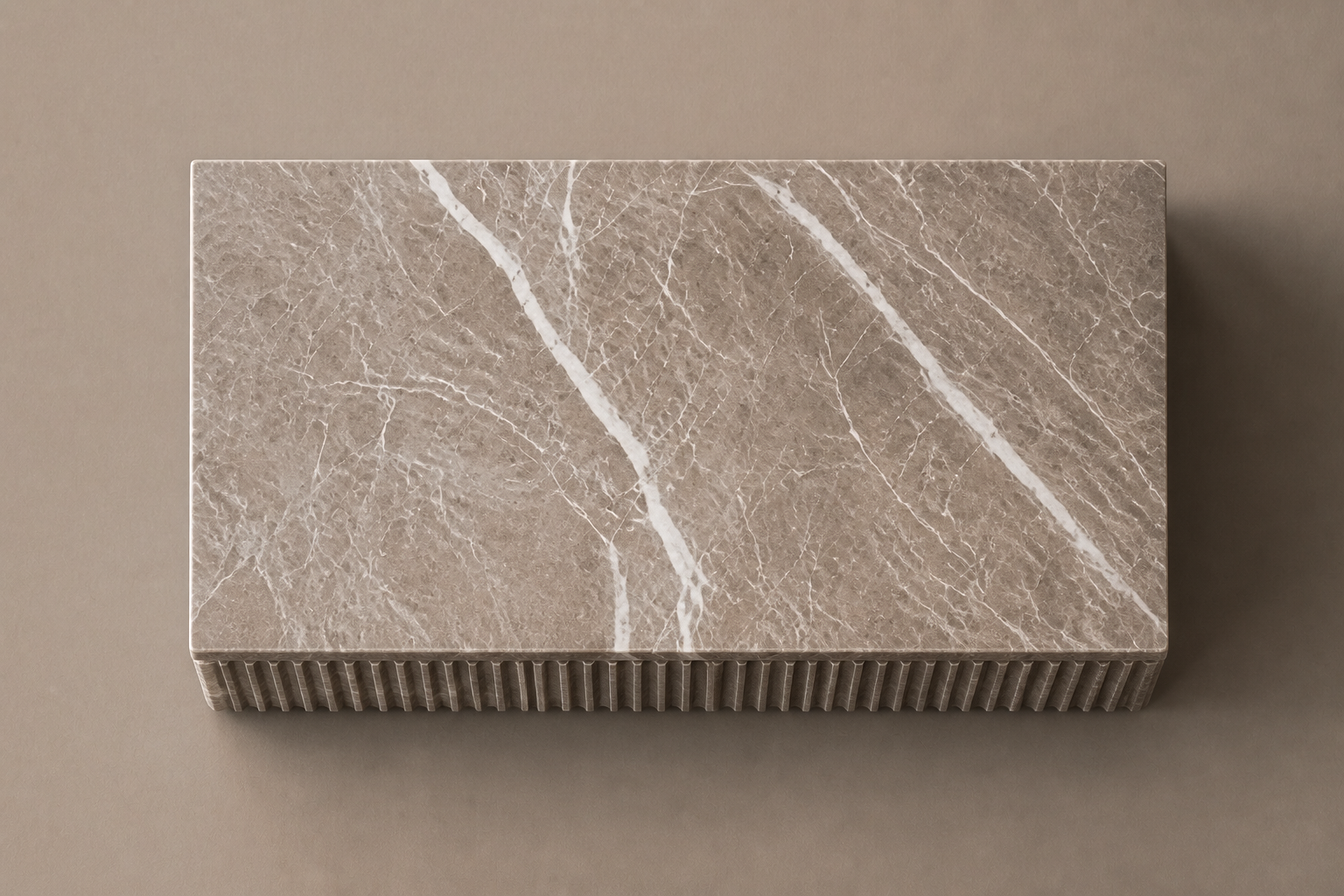 Pietra Grey Reeded Base Warm pietra grey marble plinth base by 1-OPH, overhead view