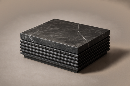 Ribbed Horizontal Base Stacked black marble plinth base by 1-OPH, three-quarter studio view