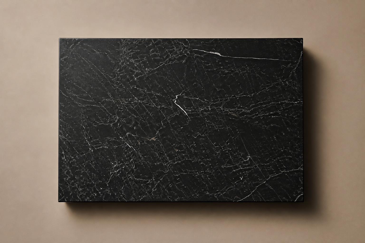 Shadow-Gap Base Low black marble plinth base by 1-OPH, overhead view