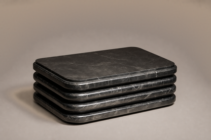 Triple Bullnose Base Rounded black marble plinth base by 1-OPH, three-quarter studio view