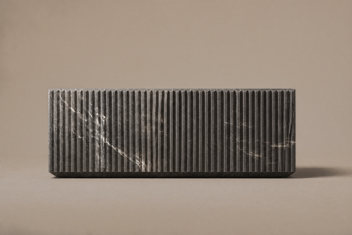 Pietra Grey Reeded Base Grey pietra grey marble plinth base by 1-OPH, side elevation