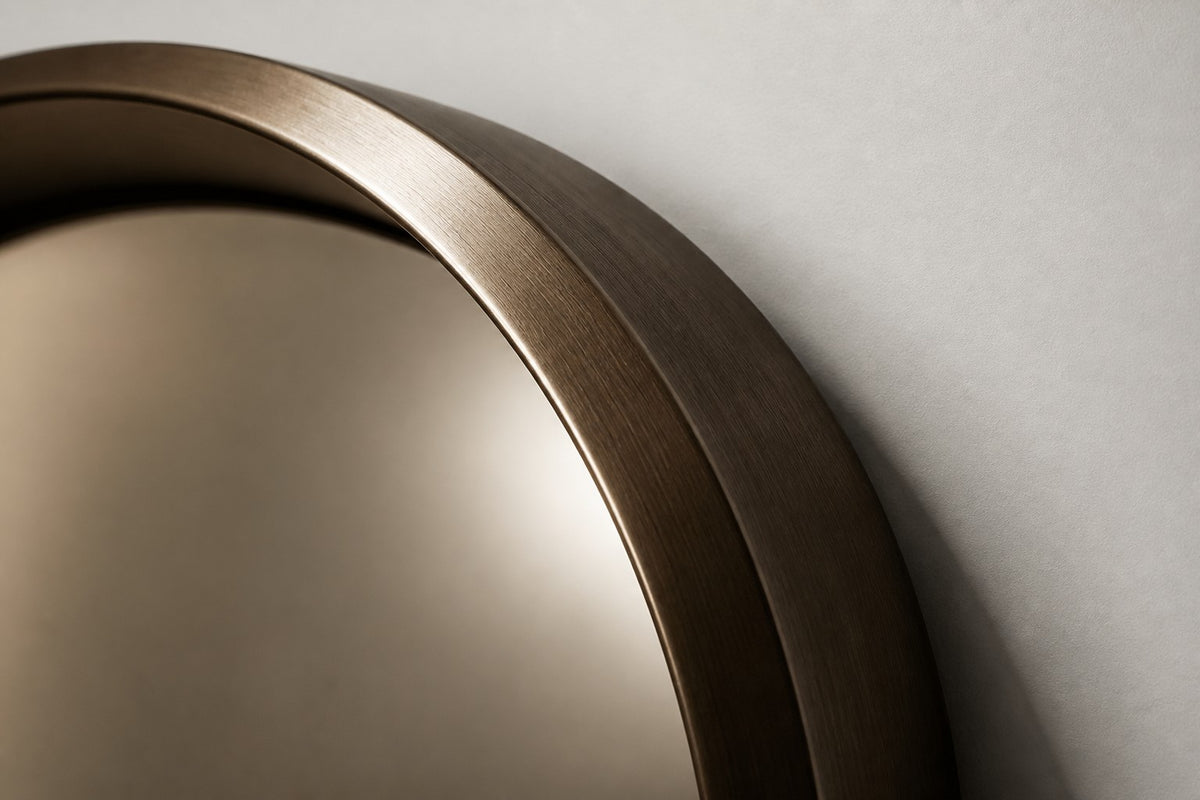 Pupila — Ø 200 cm convex mirror in a dark patinated bronze ring, close detail of the surface and edge