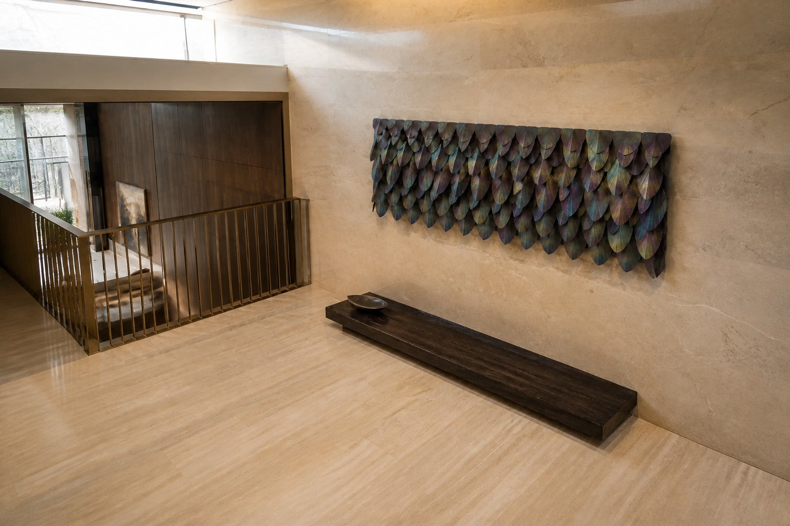 Rust orange and umber bronze wall sculpture Corteza, cast bark-textured plates shingled across a long rail, on a plaster wall.