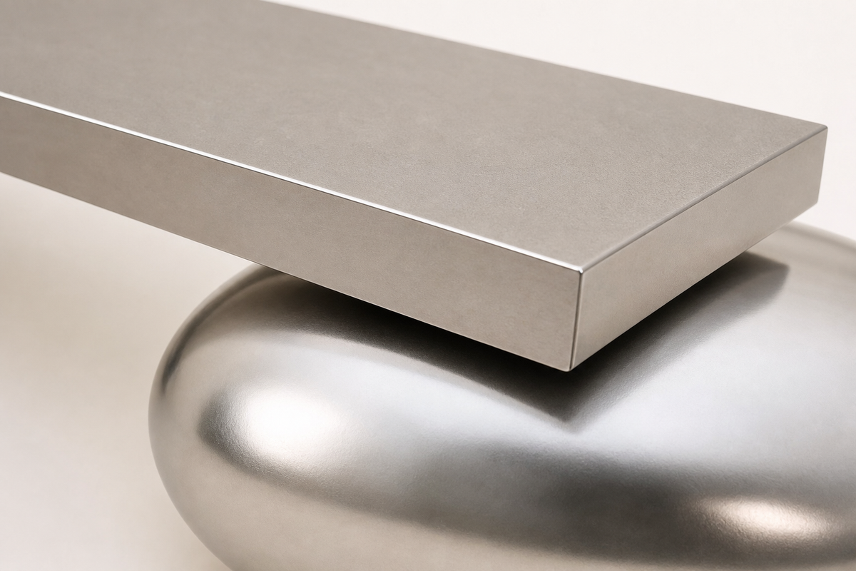 Repose stainless steel sculptural bench, close studio detail of the surface and material