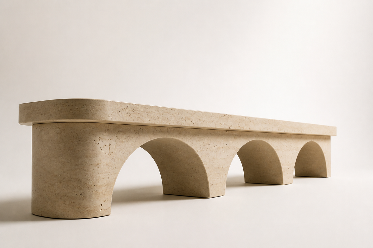 Reposo 180 limestone sculptural bench, three-quarter studio view showing its profile