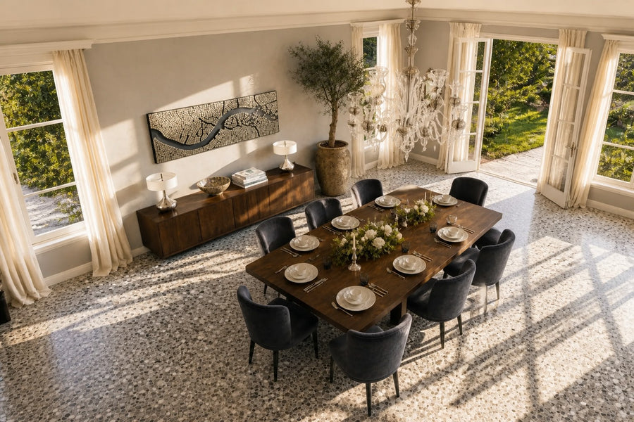 Rialto — 260 × 14 cm long mirror-mosaic wall panel crossed by a winding black river, seen from above in the room