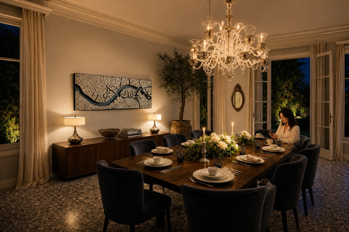 Rialto — 260 × 14 cm long mirror-mosaic wall panel crossed by a winding black river, the same room at night, lamps on