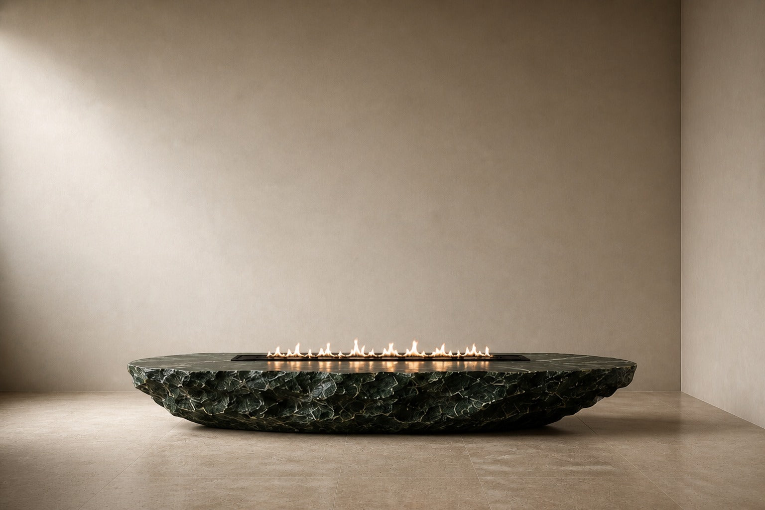 Deep green marble fire table Sacharu 220, deep green with pale veining, on a pale stone floor.