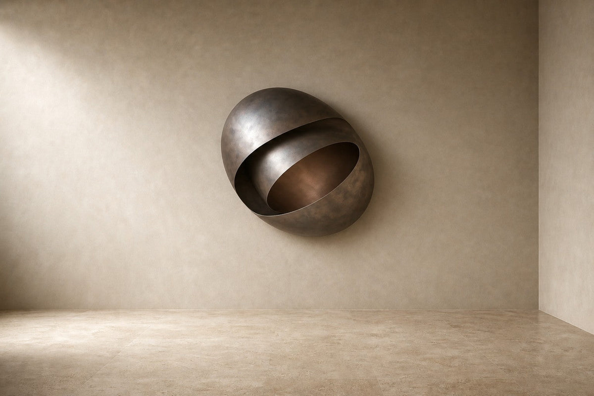 Sadaf — 150 × 90 cm dark bronze wall sculpture of a curled shell with a polished inner band, studio view of the whole piece
