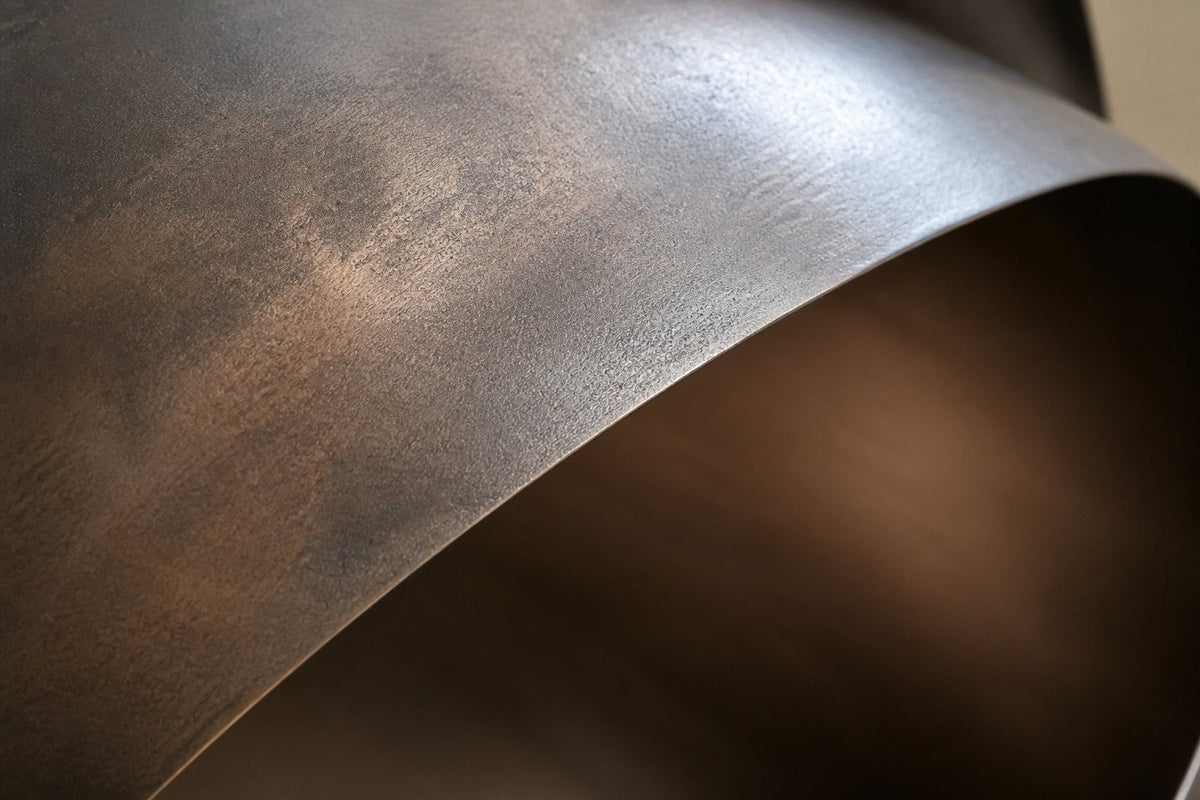 Sadaf — 150 × 90 cm dark bronze wall sculpture of a curled shell with a polished inner band, close studio detail of the surface and material