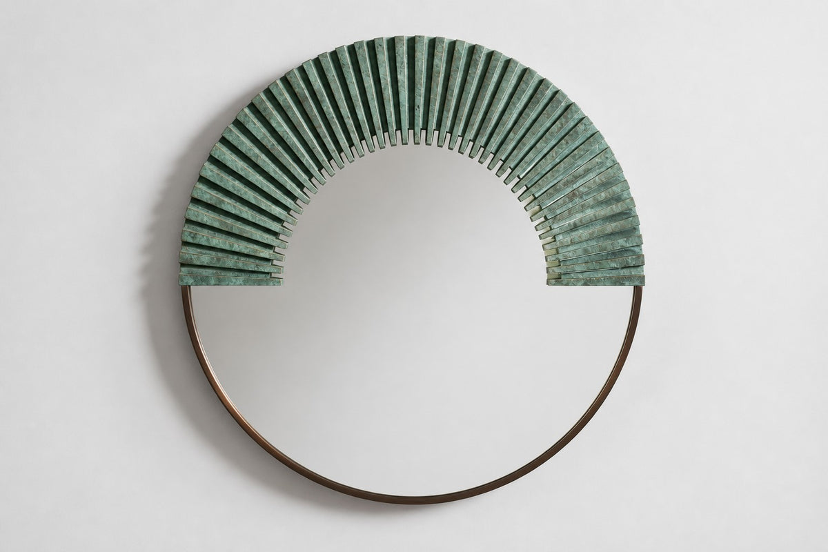 Sana — Ø 140 cm round wall mirror with a verdigris bronze sunburst, studio front view