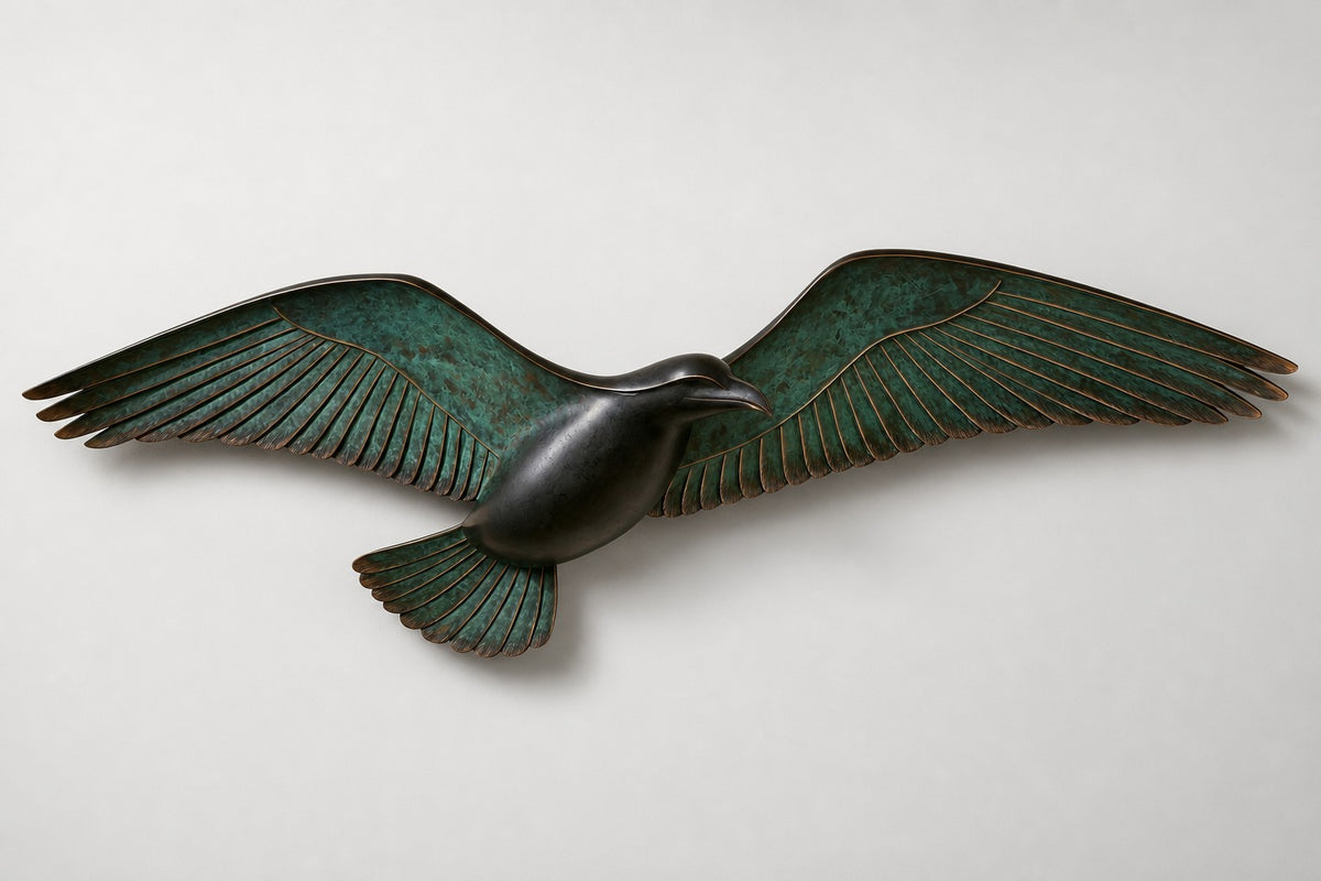 Saqr — verdigris bronze falcon in flight wall sculpture, studio front view