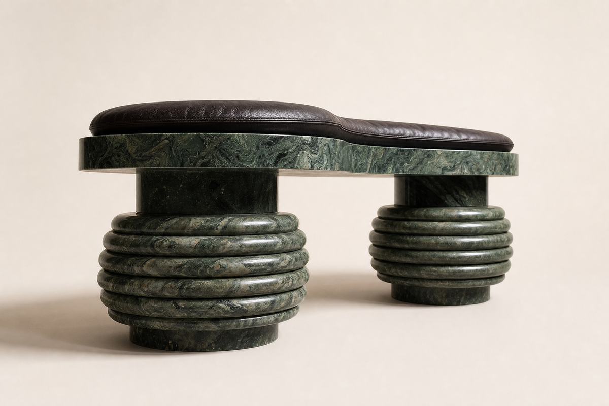 Sedara stone sculptural bench, three-quarter studio view showing its profile