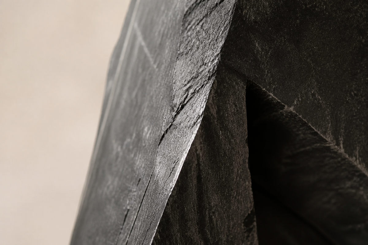 SENTINEL stone sculpture, close studio detail of the surface and material