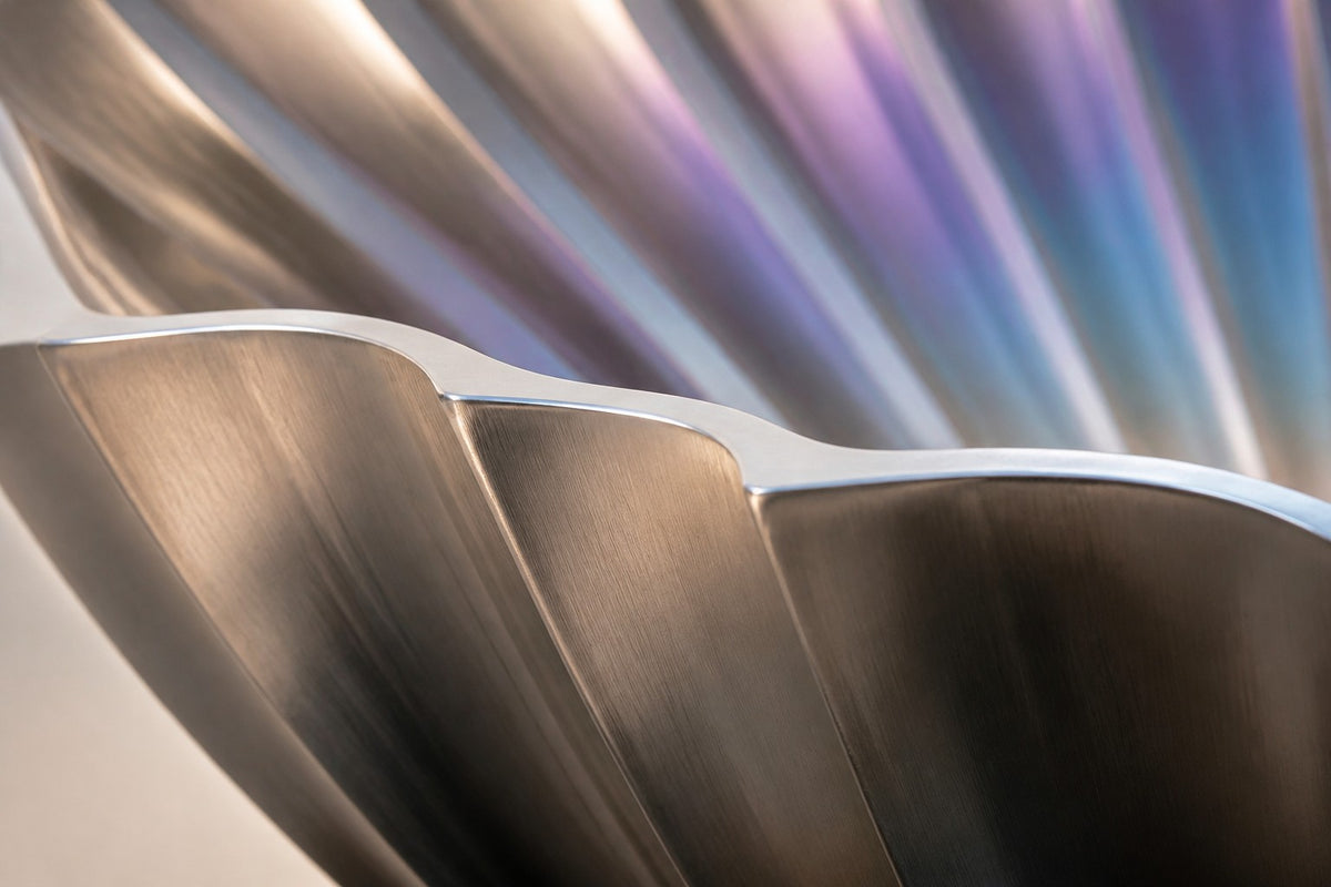 Serein — iridescent scallop wall fountain, close detail of the surface and edge