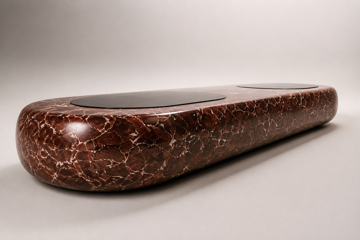 Shafaq 180 marble sculptural bench, three-quarter studio view showing its profile