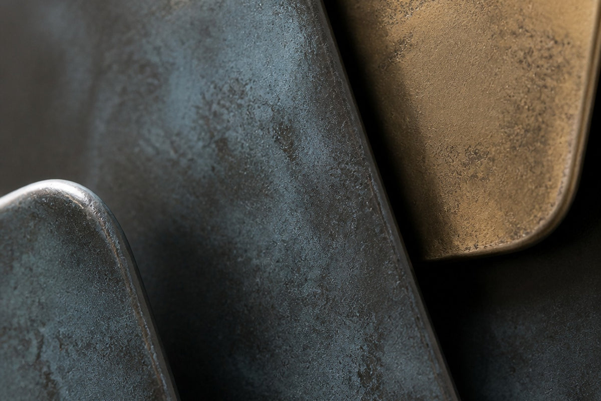 Shazaya 140 — 140 cm wall sculpture of overlapping rounded slabs in blue patinated bronze and brass, close studio detail of the surface and material