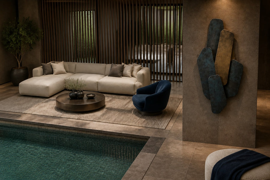 Shazaya 140 — 140 cm wall sculpture of overlapping rounded slabs in blue patinated bronze and brass, seen from above in the room