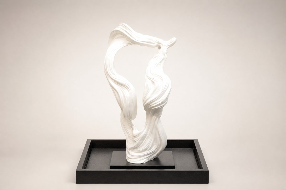 Shiranami — white ribbon fountain in a black square basin, studio front view