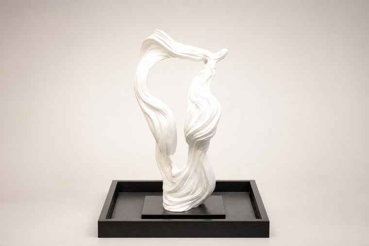 Shiranami — white ribbon fountain in a black square basin, studio front view