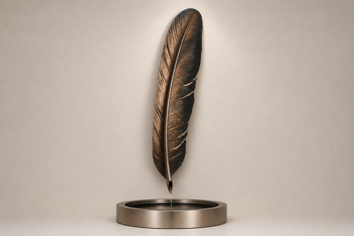 Solenne — bronze feather wall fountain, studio front view