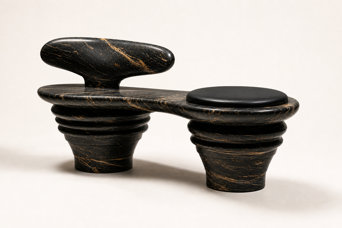 Sosta stone sculptural bench, three-quarter studio view showing its profile
