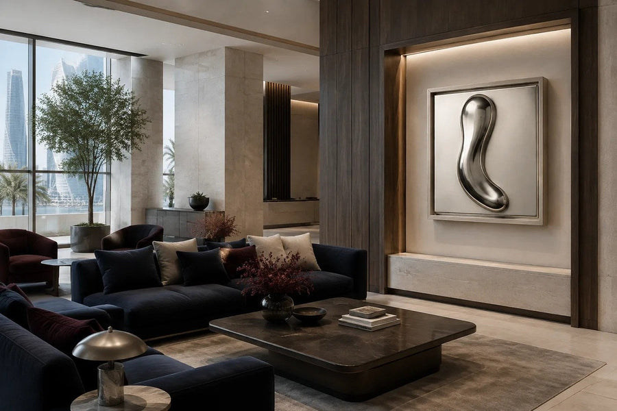 Traccia — 180 × 50 cm framed steel relief of a single wavy line on a dark ground, placed in a furnished room