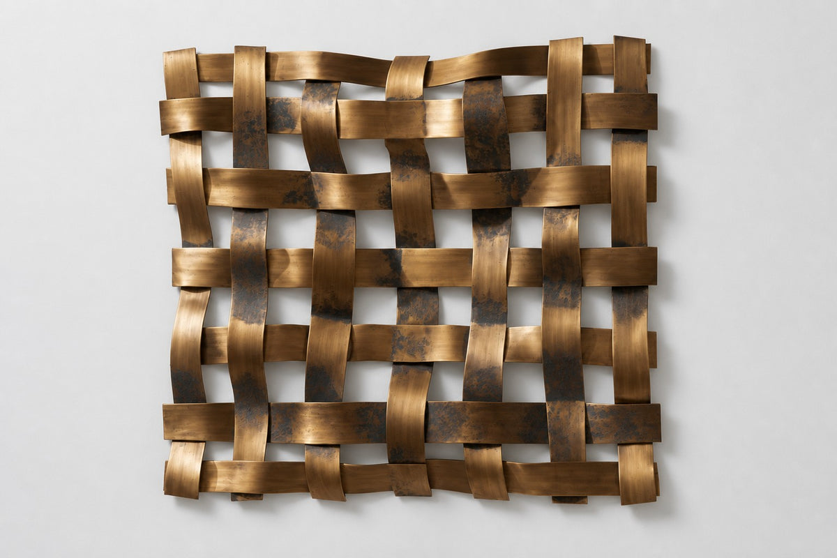 Trama — woven brass strip square wall sculpture, studio front view