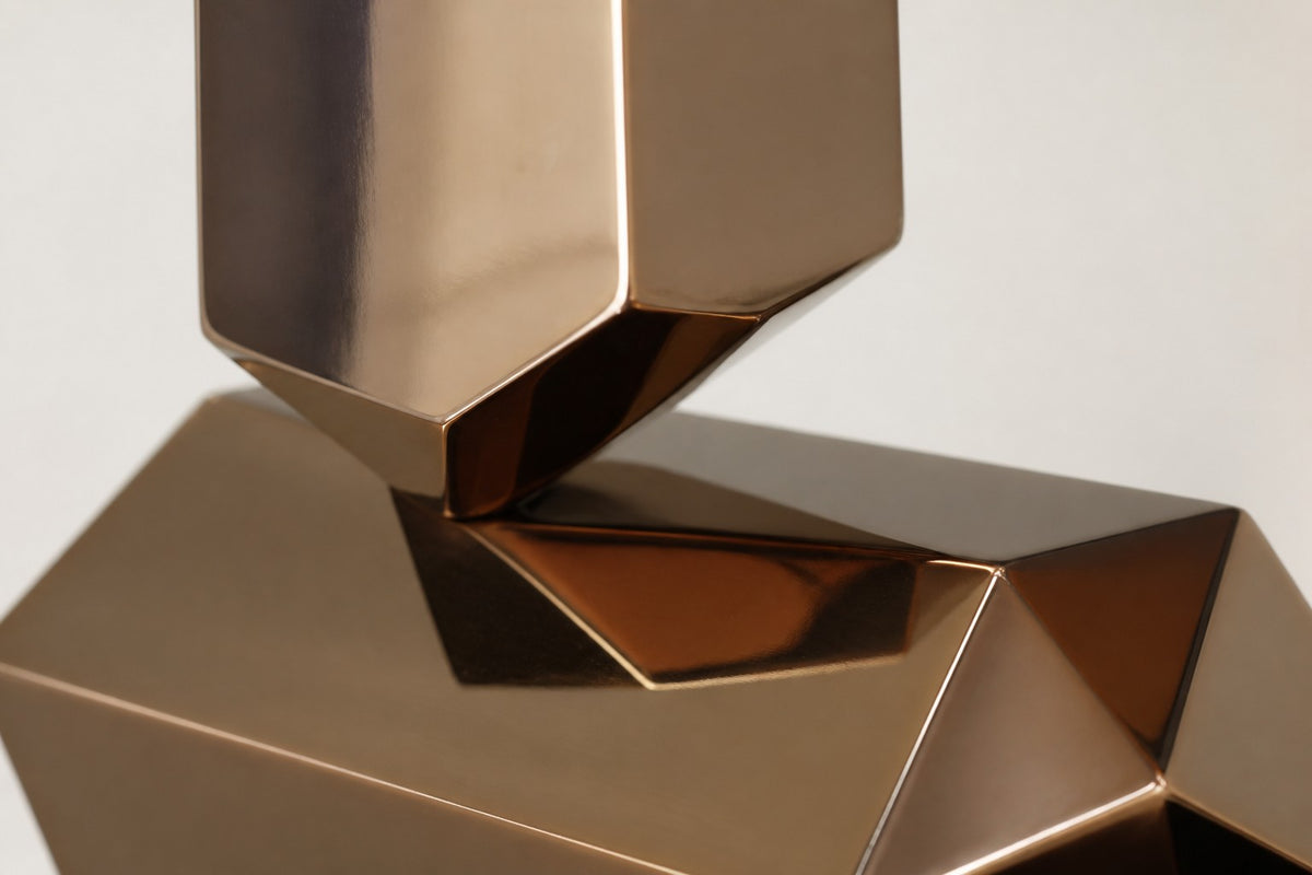 Trongsa — polished bronze faceted stacked sculpture, close detail of the surface and edge
