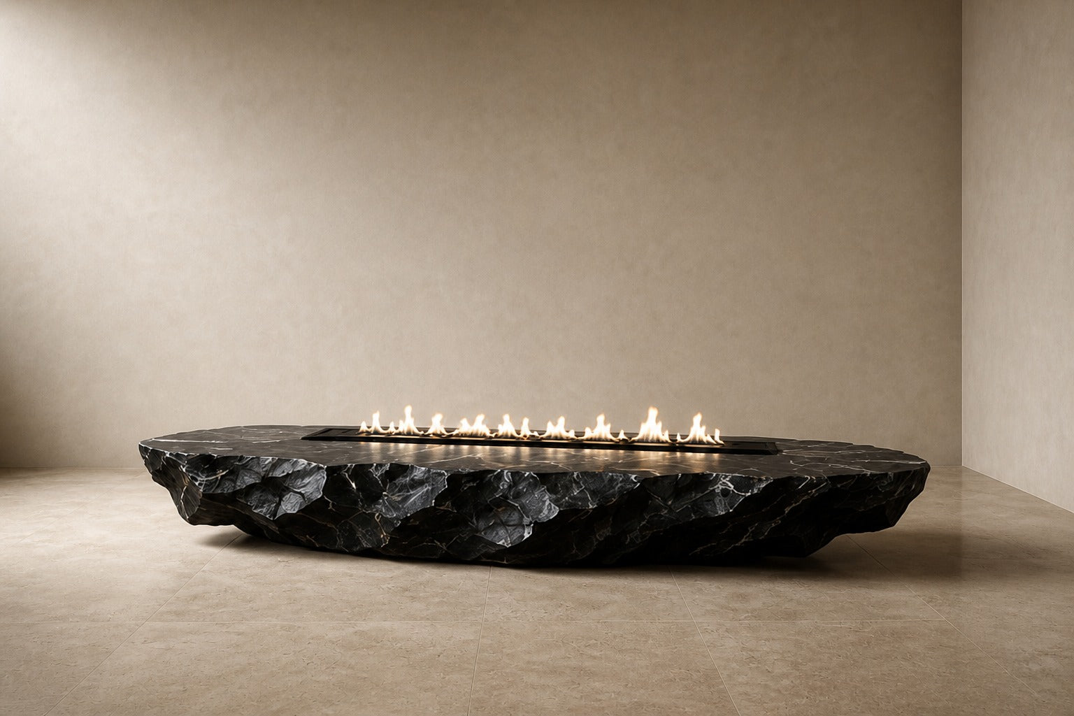 Black basalt fire table Tsukage 220, dense black with fine grey veining, on a pale stone floor.