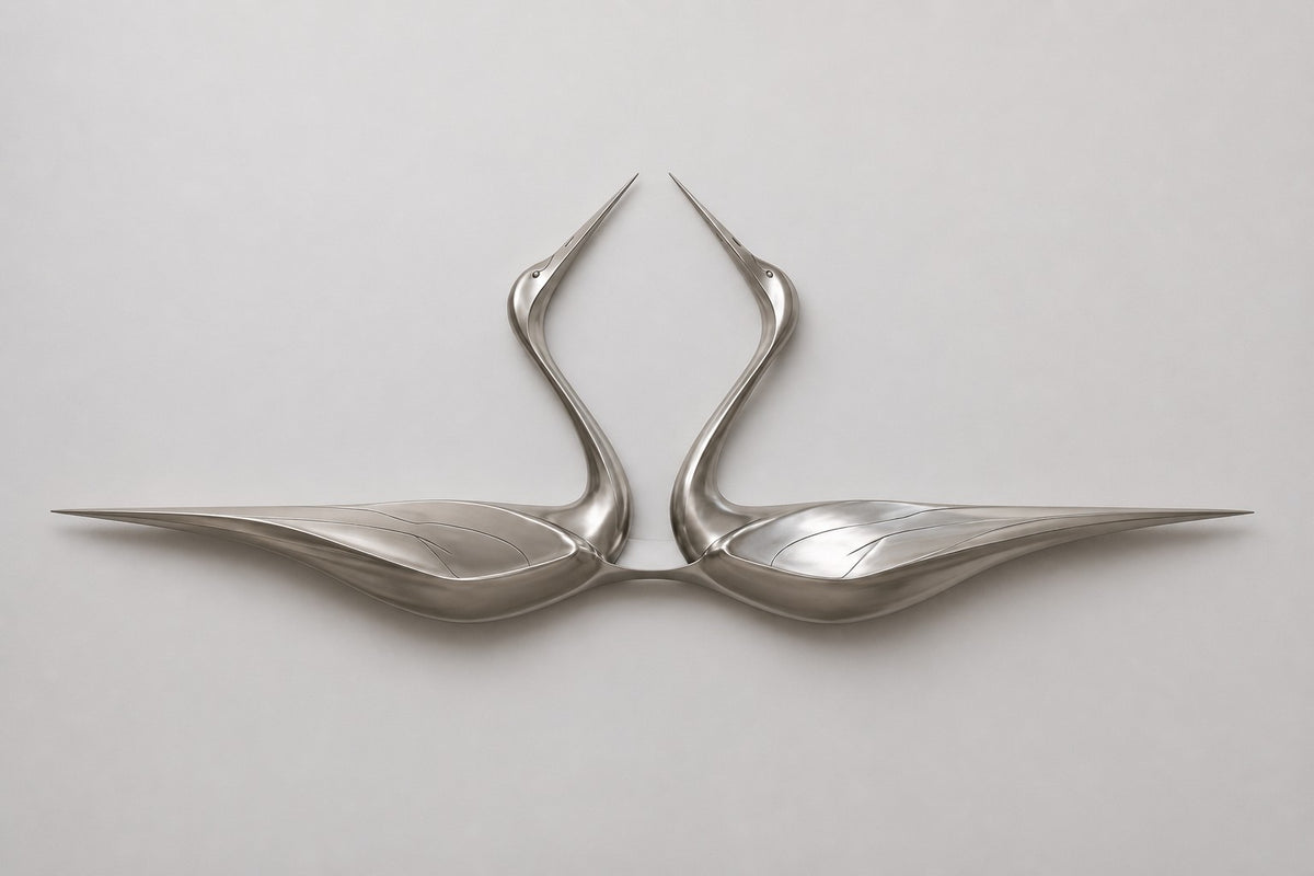 Tsuru — satin stainless steel pair of cranes wall sculpture, studio front view