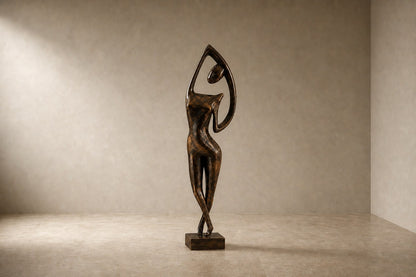 Patinated bronze figure sculpture Voluta, one arm arced overhead into a closed loop, on a small bronze block base.