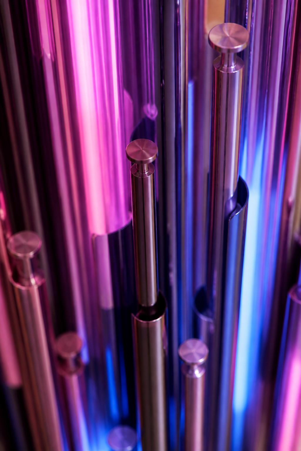 Wahaj — 80 × 150 cm vertical cluster of iridescent purple and blue rods, close studio detail of the surface and material