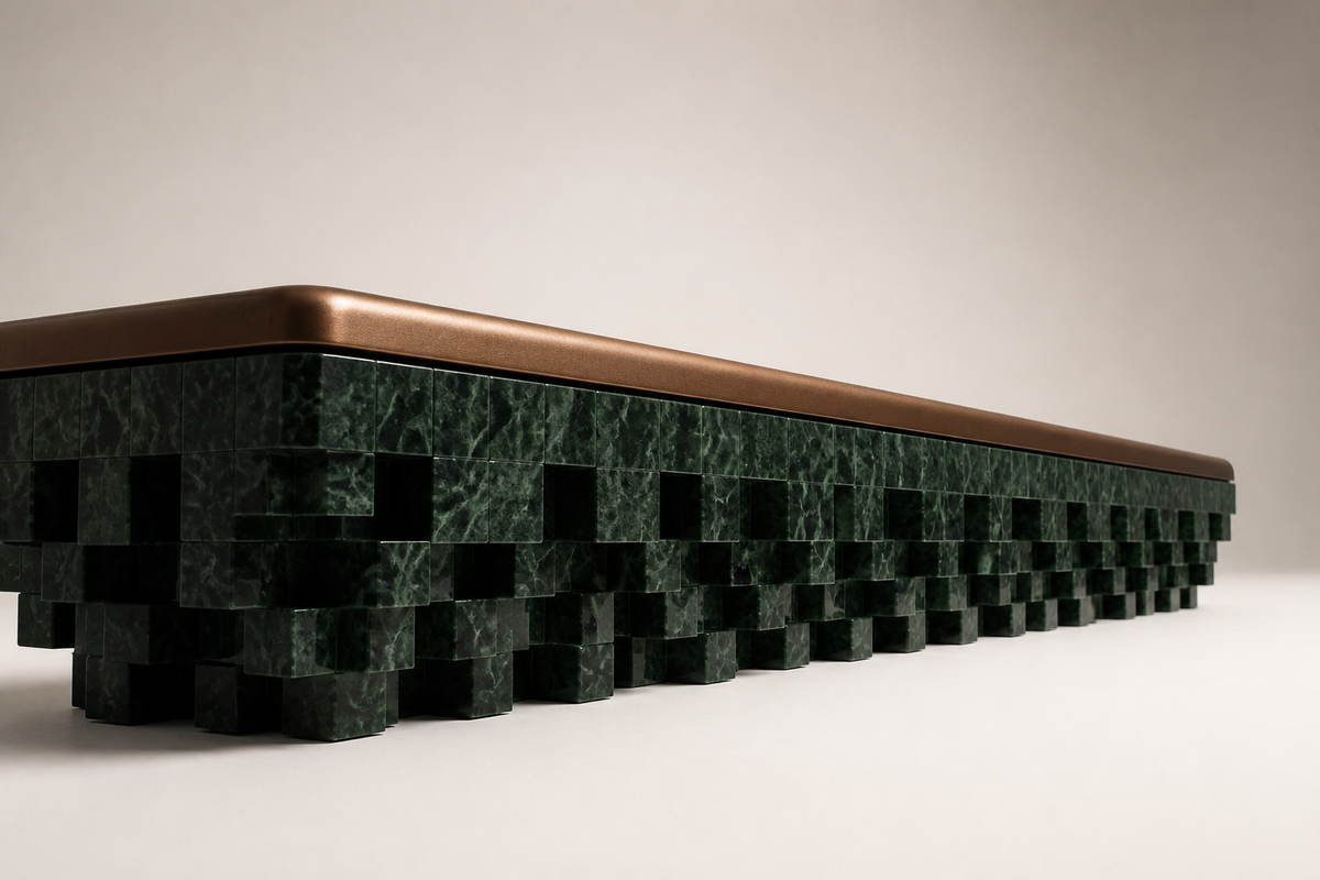Yasumi 180 marble sculptural bench, three-quarter studio view showing its profile