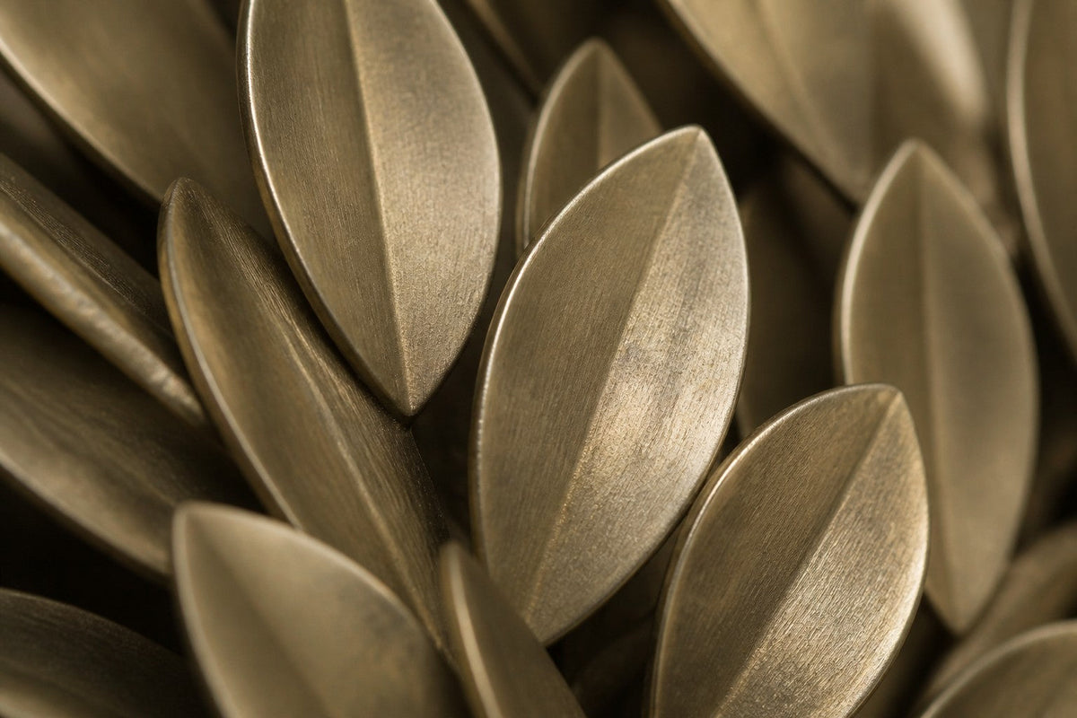Zaytuna — 180 × 140 cm brass wall sculpture of an olive tree with a spreading canopy, close studio detail of the surface and material